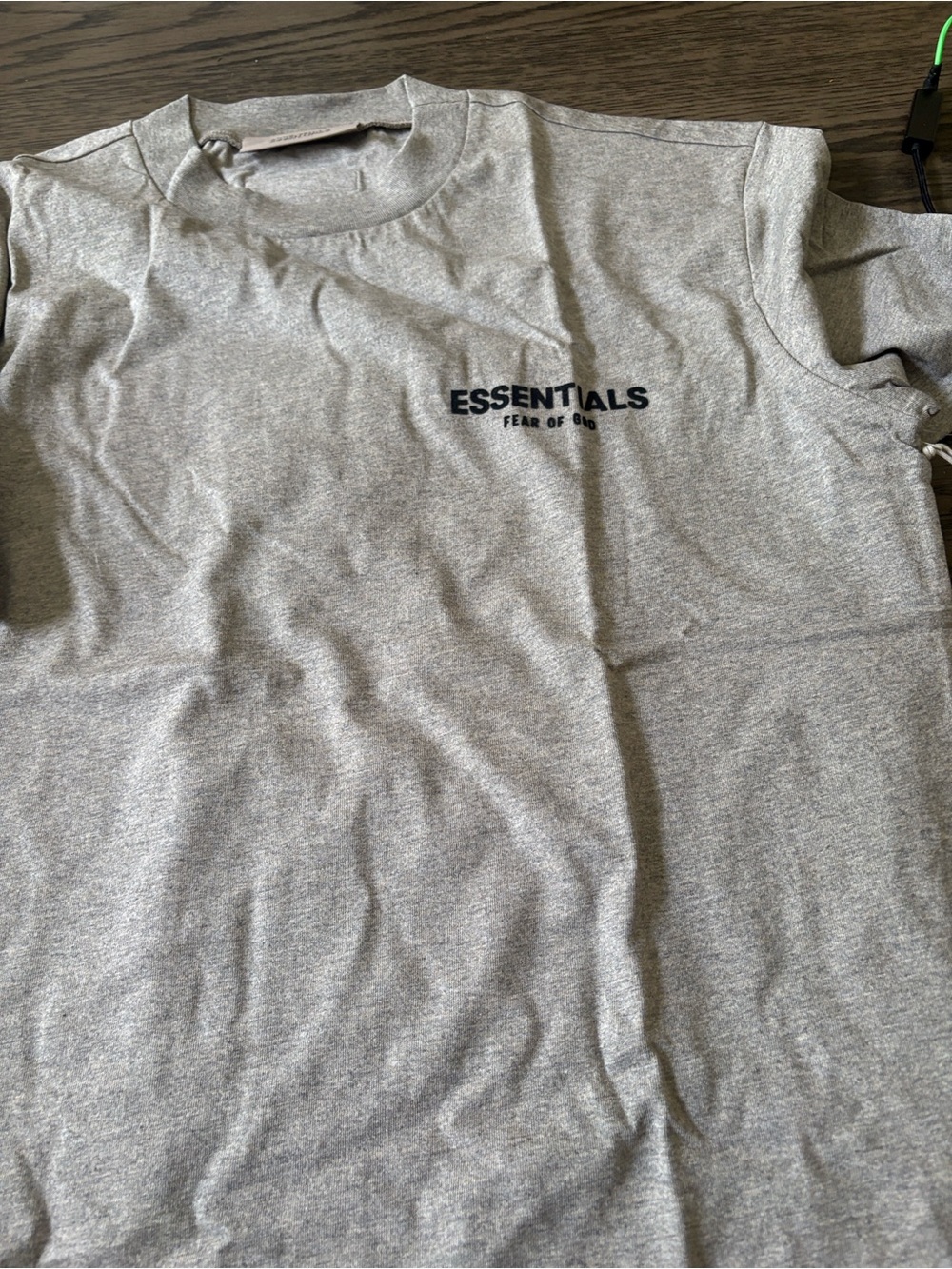 Fear of God ESSENTIALS Long Sleeve Tee in Translucent White Packaging